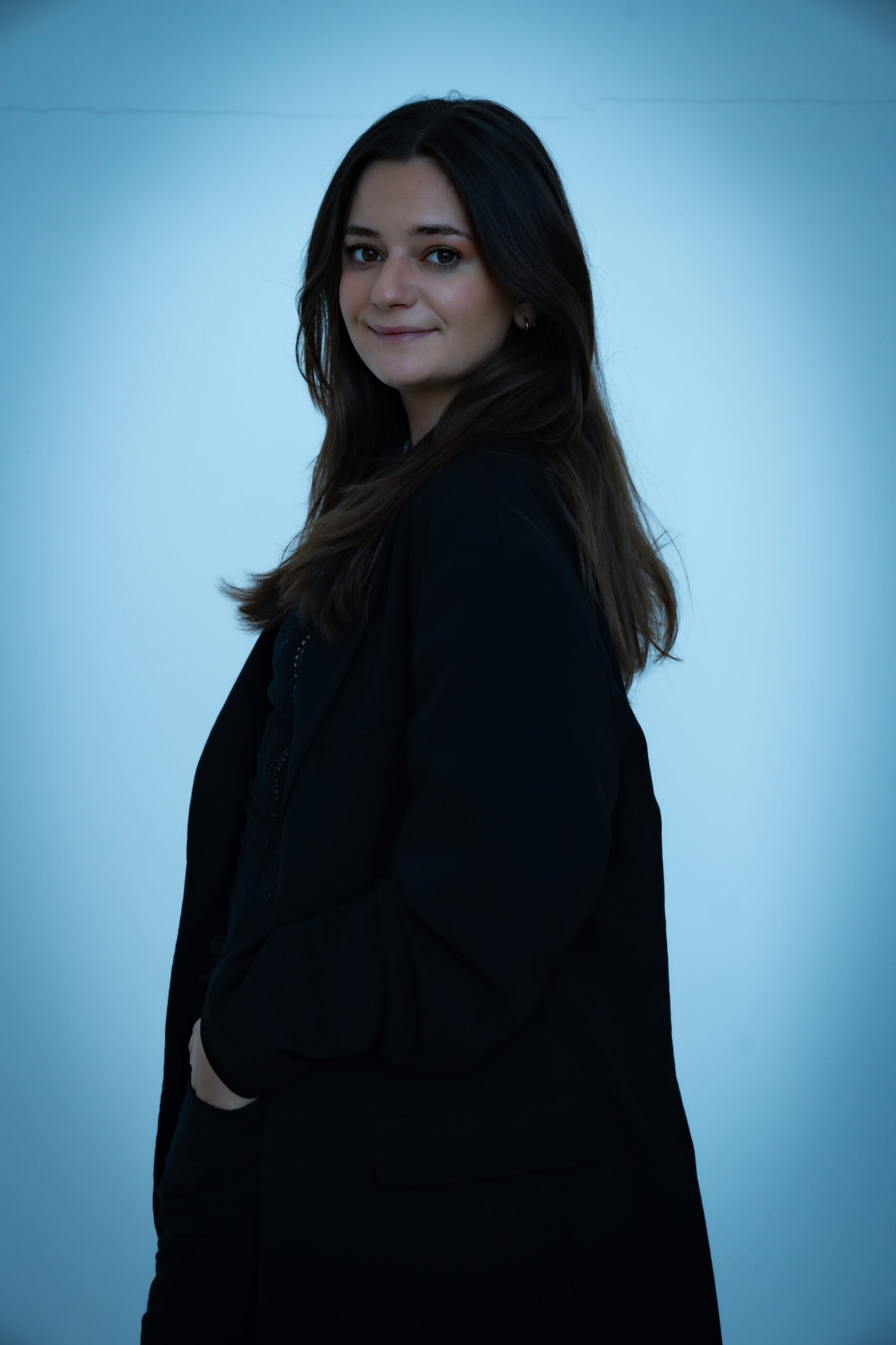 Side profile studio portrait in black