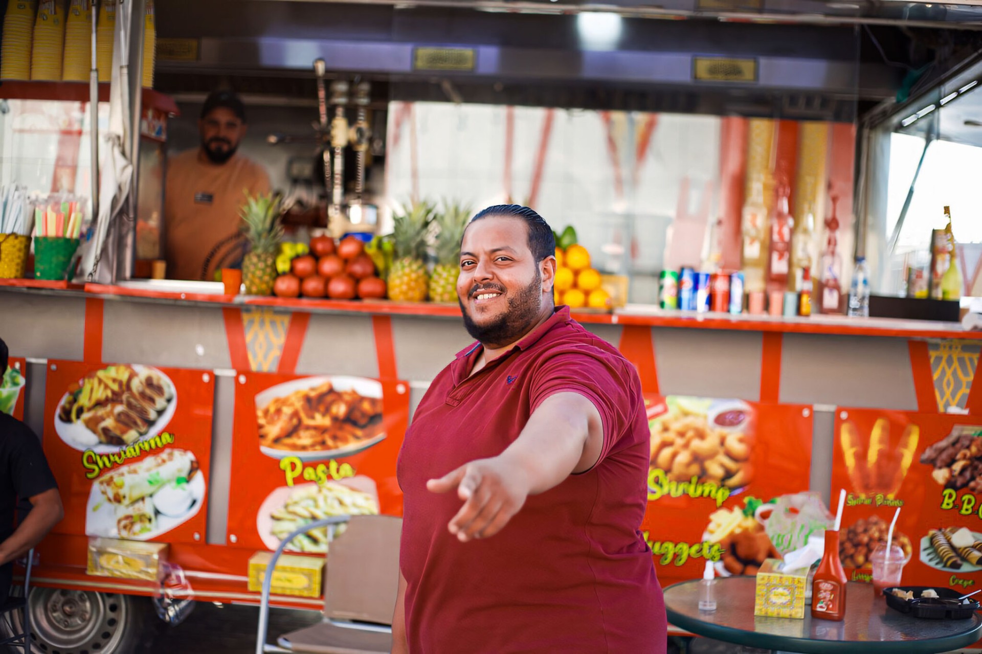 Smiling street food vendor portrait
