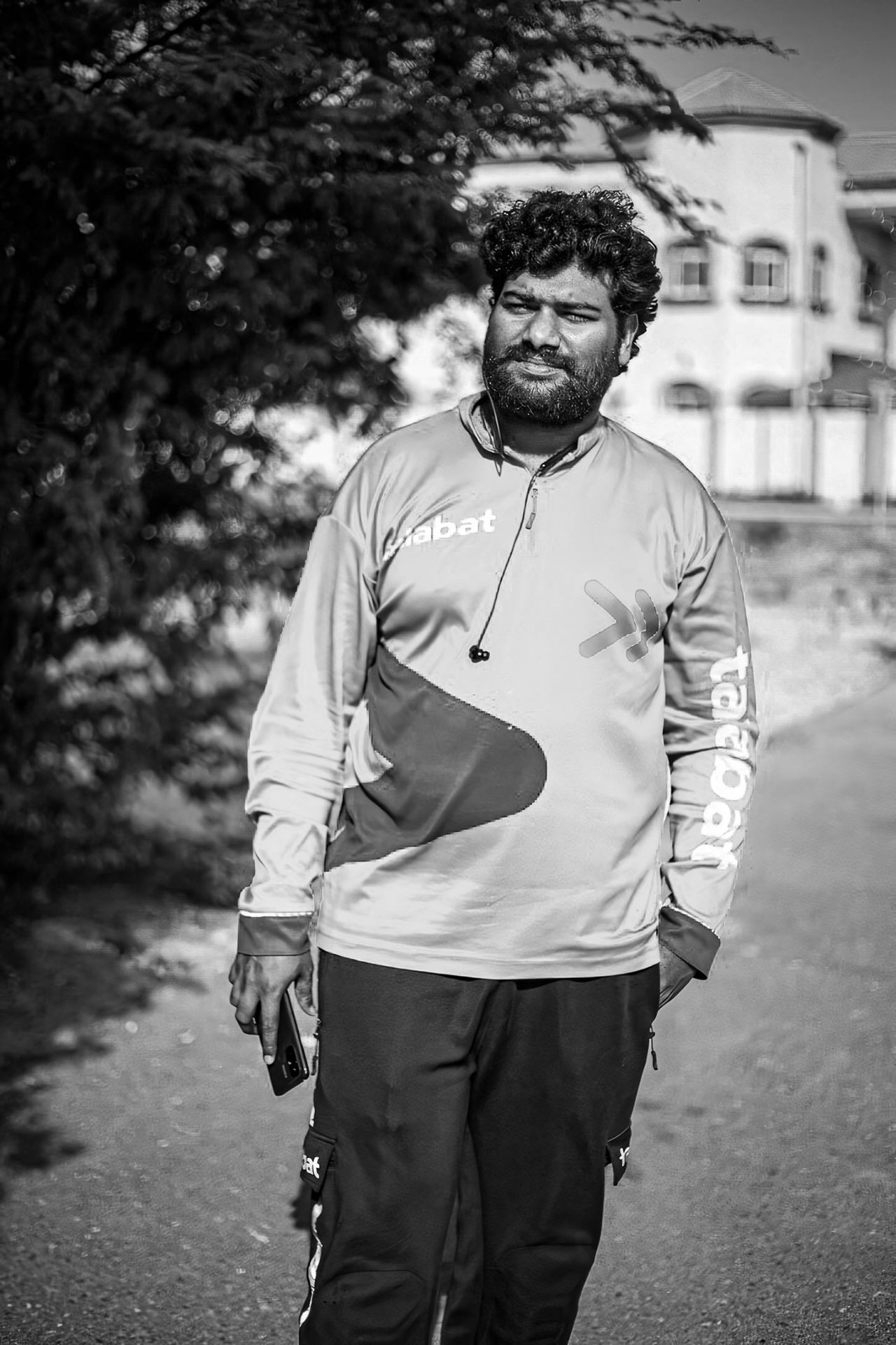 Black and white delivery worker portrait