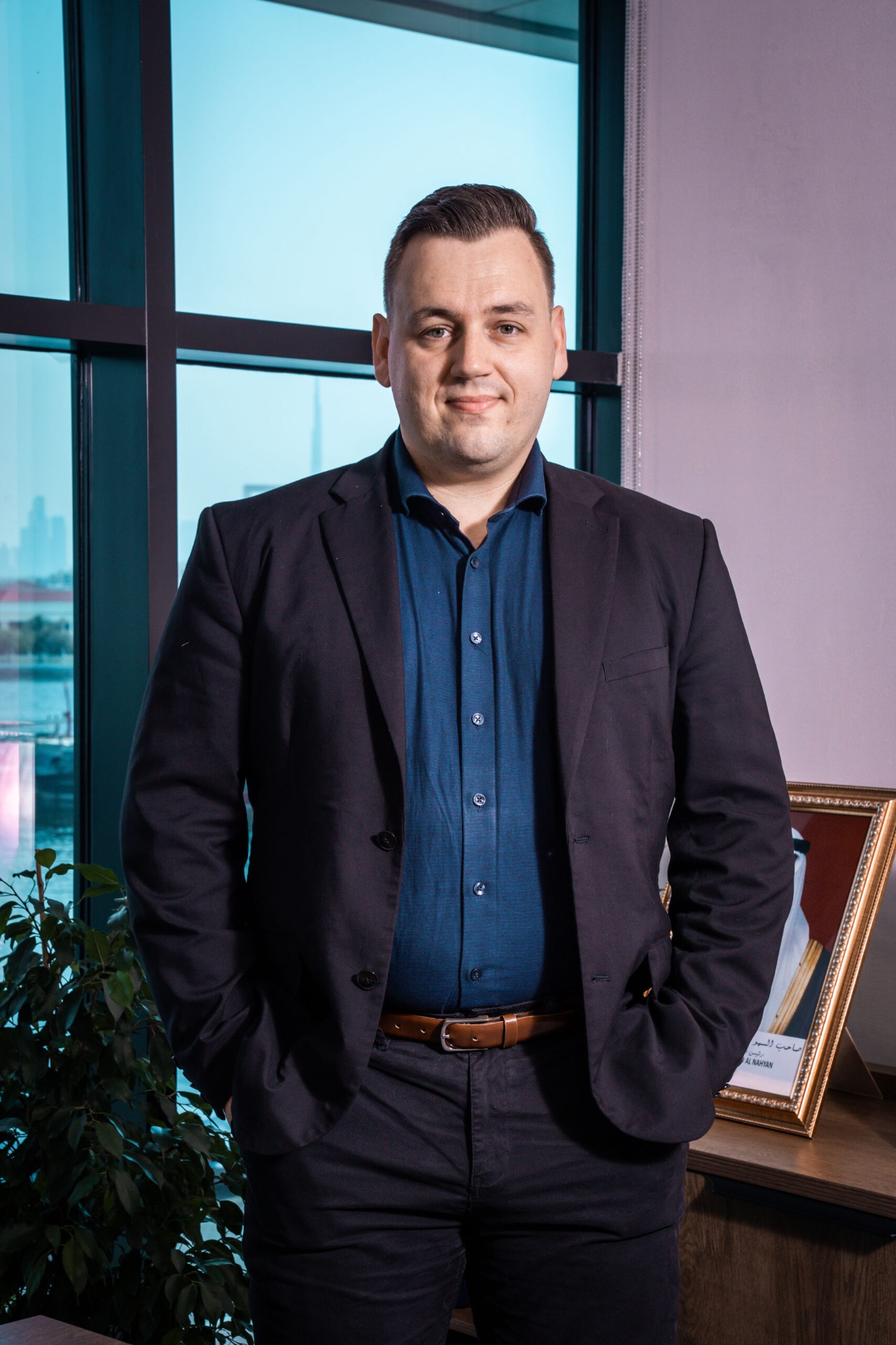 Corporate full-length portrait in office