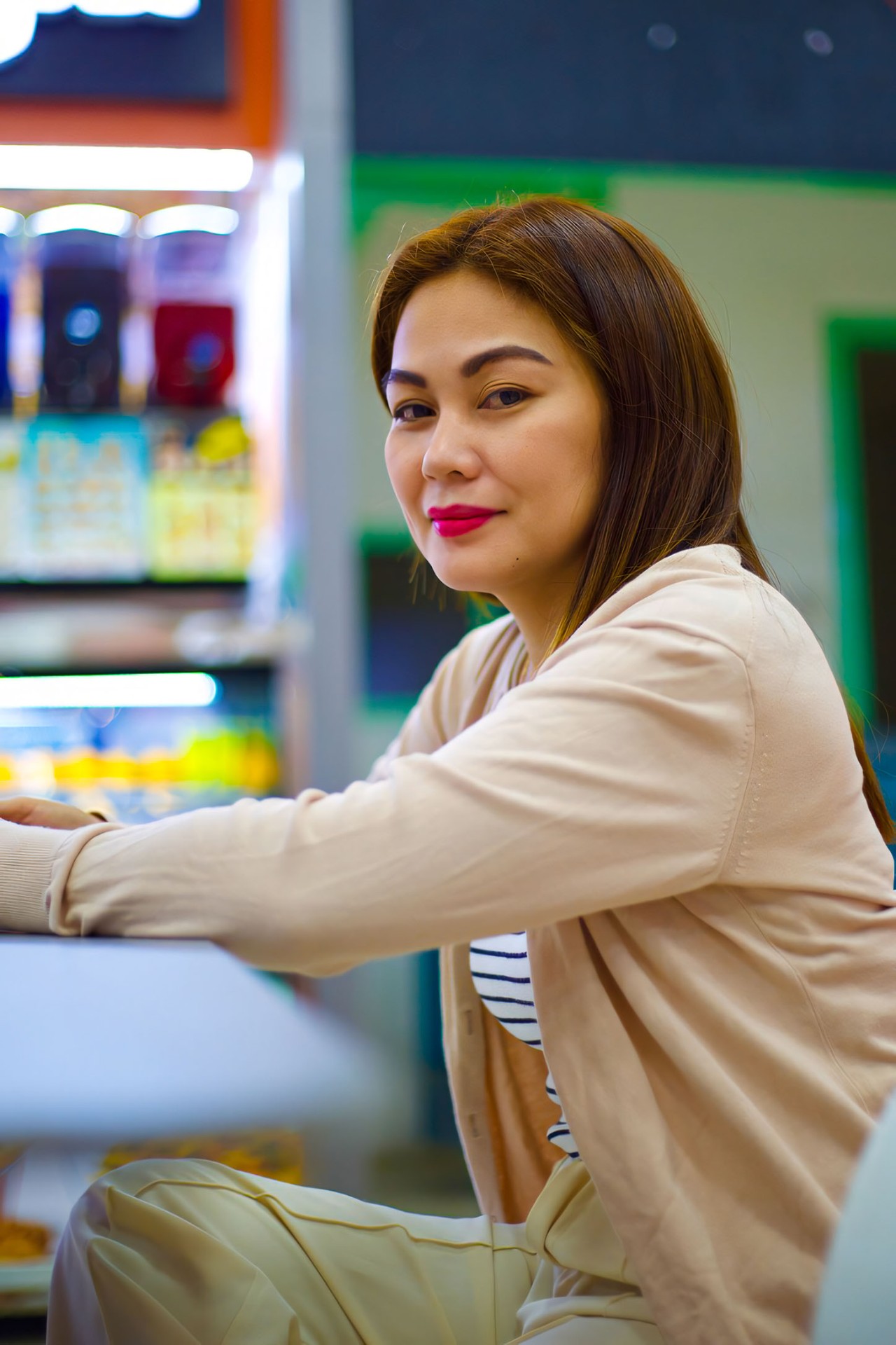 Portrait at convenience store counter